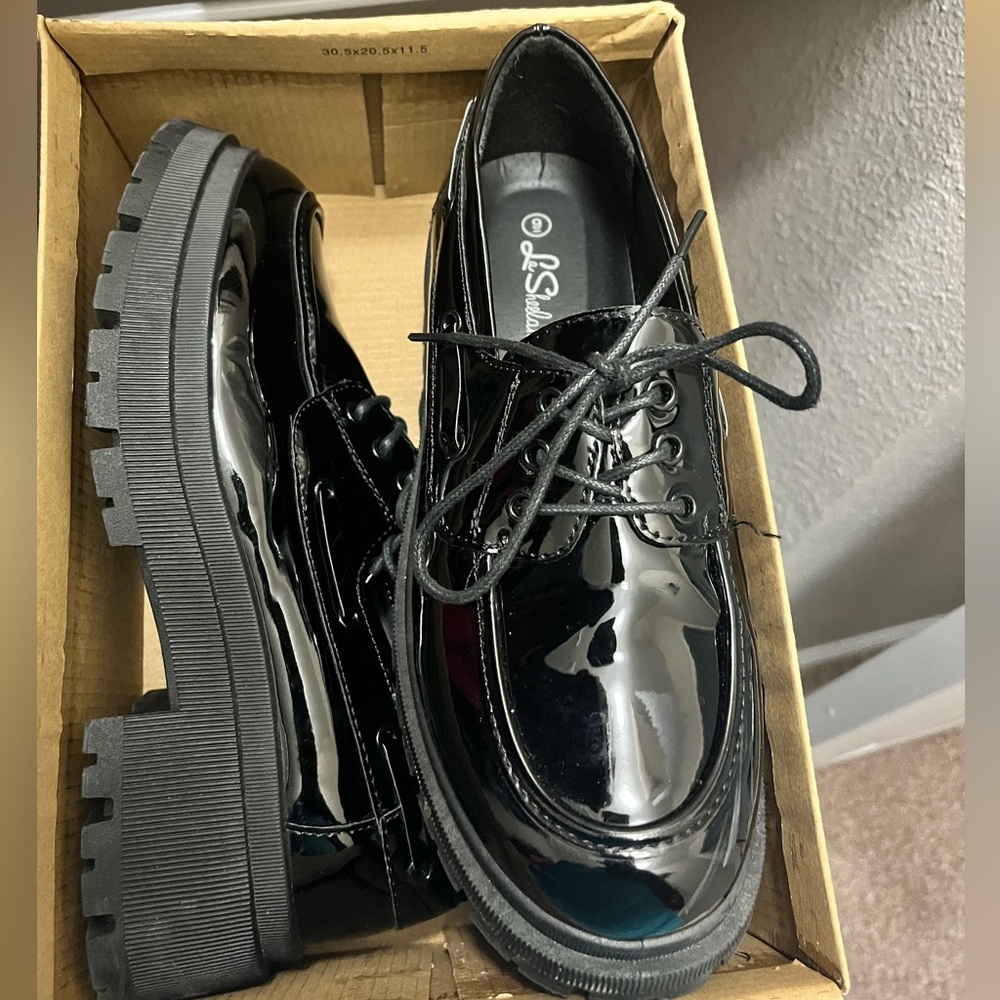Black platform loafers